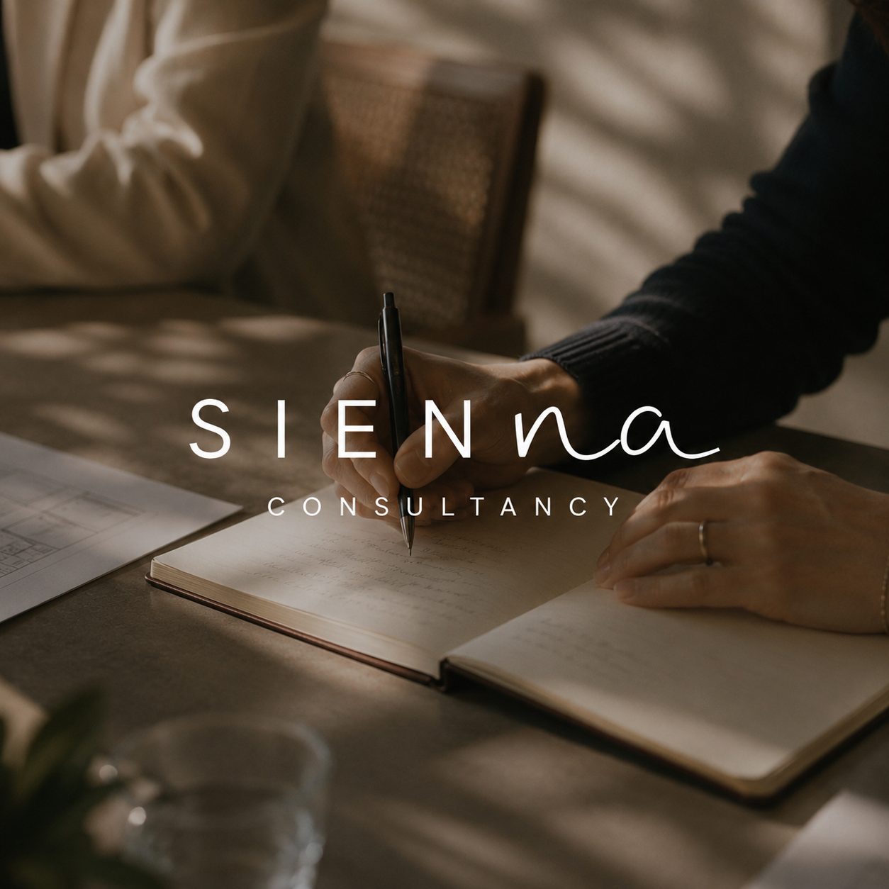 SIENNA wordmark in a care setting corridor